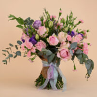 Lavender Blush bouquet with pink roses, pink carnations, purple lisianthus, eucalyptus, jute wrap, and pastel ribbon by Rapid Petals by Yashken Fresh