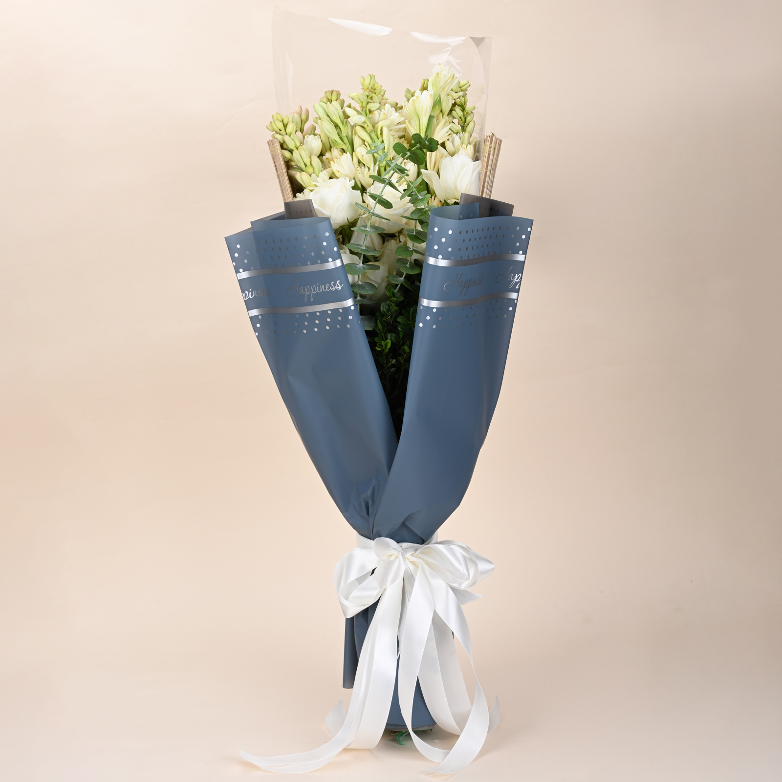 Ivory Tuberose Grace white rose and tuberose bouquet in blue wrap by Rapid Petals by Yashken Fresh