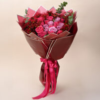 Crimson Plum Romance red and pink rose bouquet with lavender roses, deep red accent flowers, eucalyptus, glossy red wrap, and pink ribbon by Rapid Petals by Yashken Fresh