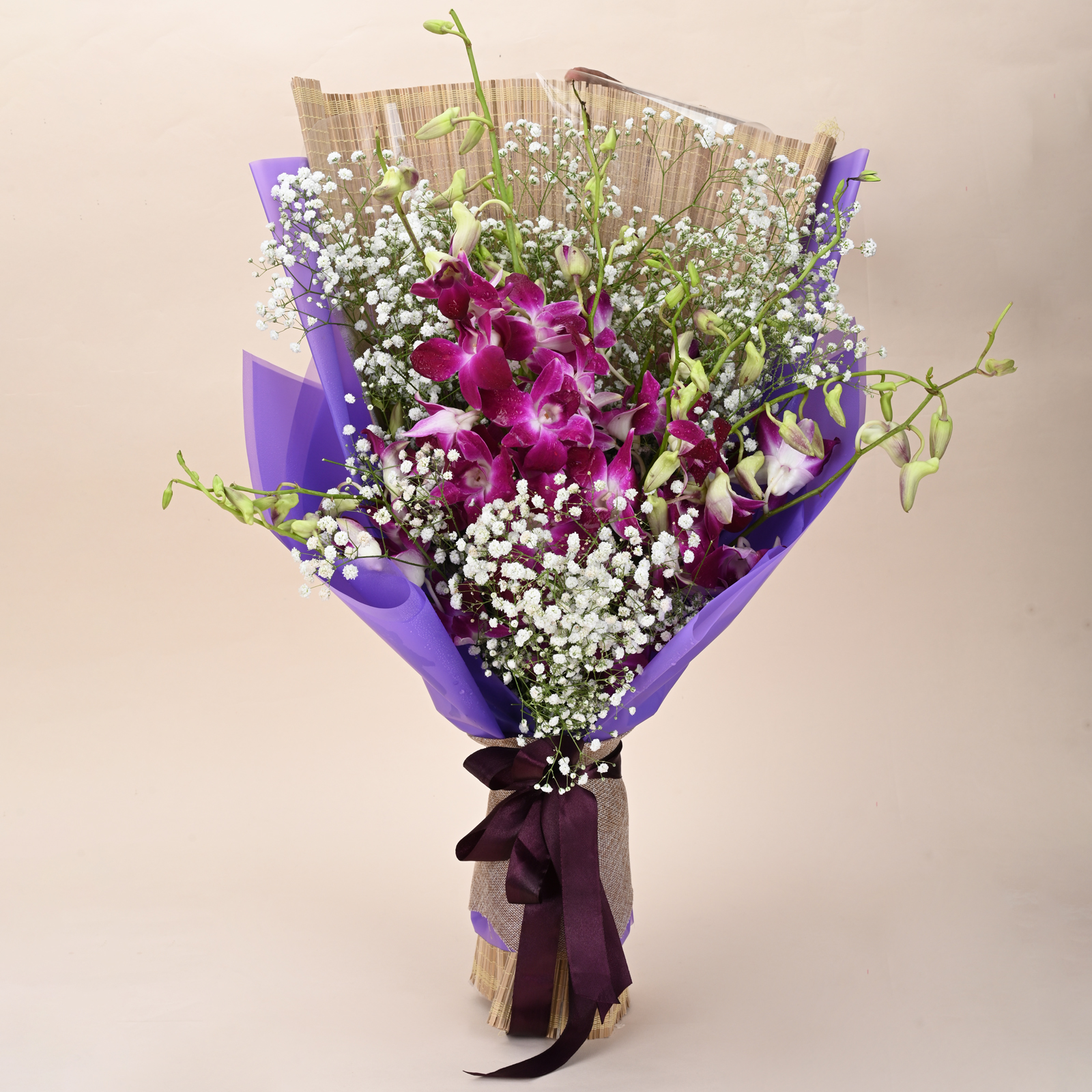 Orchid Mist Grace purple orchid bouquet with baby’s breath and elegant purple wrap by Rapid Petals by Yashken Fresh