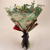 Golden Eucalyptus Bloom yellow rose bouquet with eucalyptus greenery, soft brown fillers, green transparent wrap, and dark ribbon by Rapid Petals by Yashken Fresh