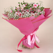 Pink Baby’s Breath Bloom pink flower bouquet with carnations, roses, baby’s breath, soft purple flowers, and bright pink wrap by Rapid Petals by Yashken Fresh
