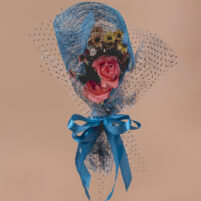Aqua Blush Whisper pink flower bouquet with pink roses, soft filler blooms, aqua blue net wrap, clear dotted paper, and blue satin ribbon by Rapid Petals by Yashken Fresh