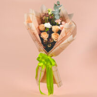Peach Lime Elegance peach flower bouquet with peach roses, white carnation, eucalyptus leaves, gold-line wrap, and lime green ribbon by Rapid Petals by Yashken Fresh