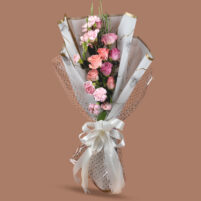 Rosy Marble Grace pastel flower bouquet with peach roses, pink lisianthus, light pink carnations, marble-style wrap, clear dotted paper, and white satin ribbon by Rapid Petals by Yashken Fresh